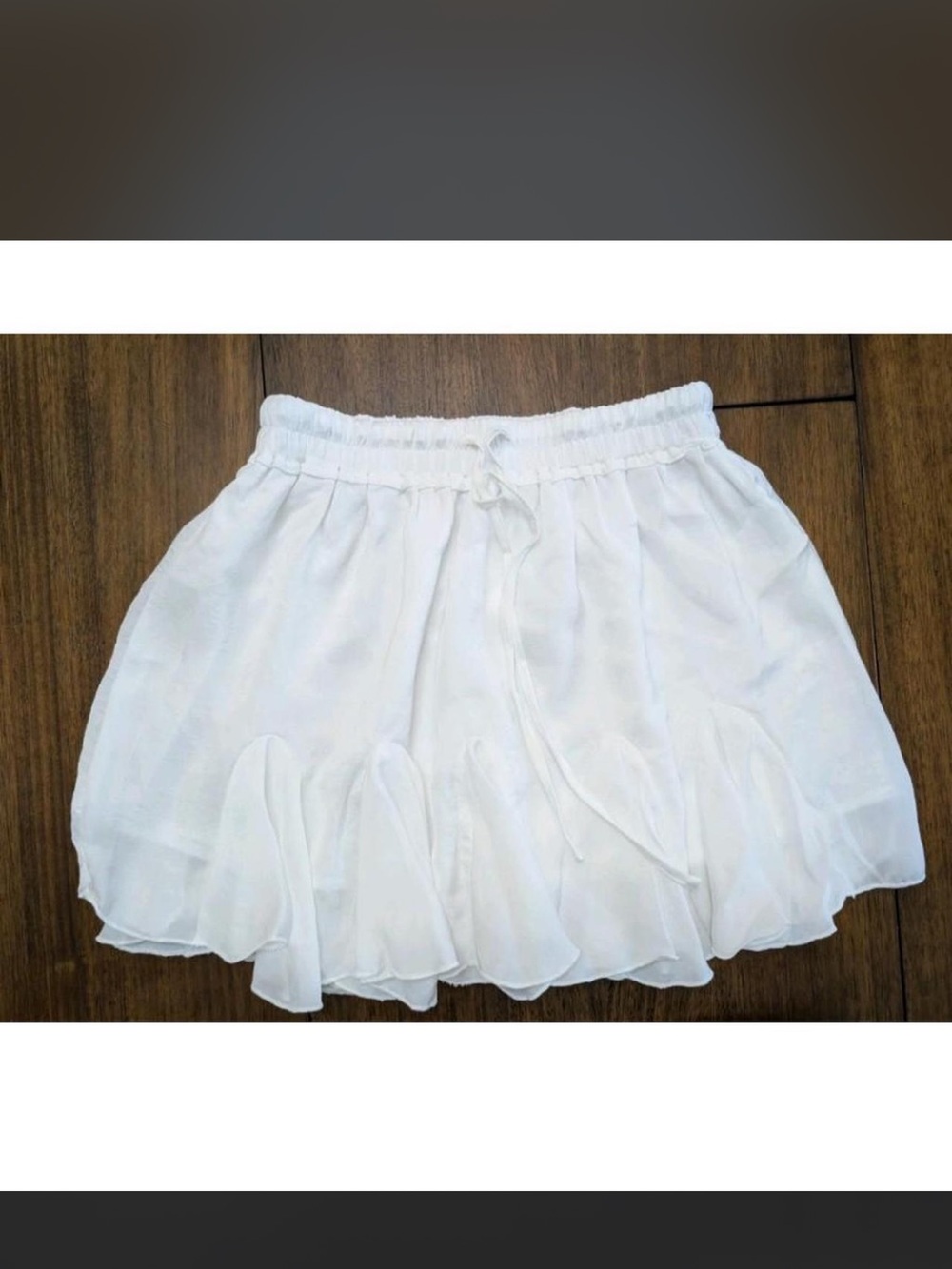 Women’s Ruffle Mini Skirt - Black / White. Small and medium - Picture 12 of 12